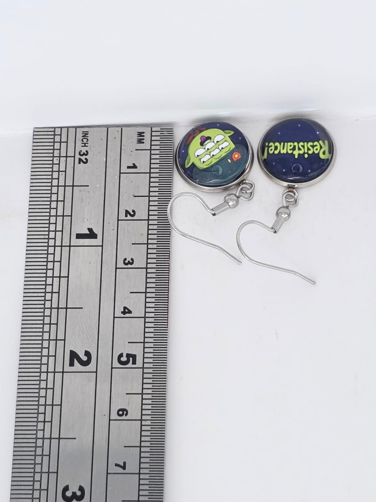 Final Space Inspired Tribore & "Resistance!" Dangle Stainless Steel Earrings