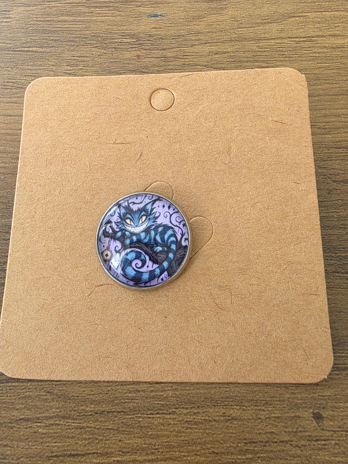 Alice in Wonderland Inspired Hellverse Cheshire Cat 20mm Stainless Steel Glass Cabochon Pin