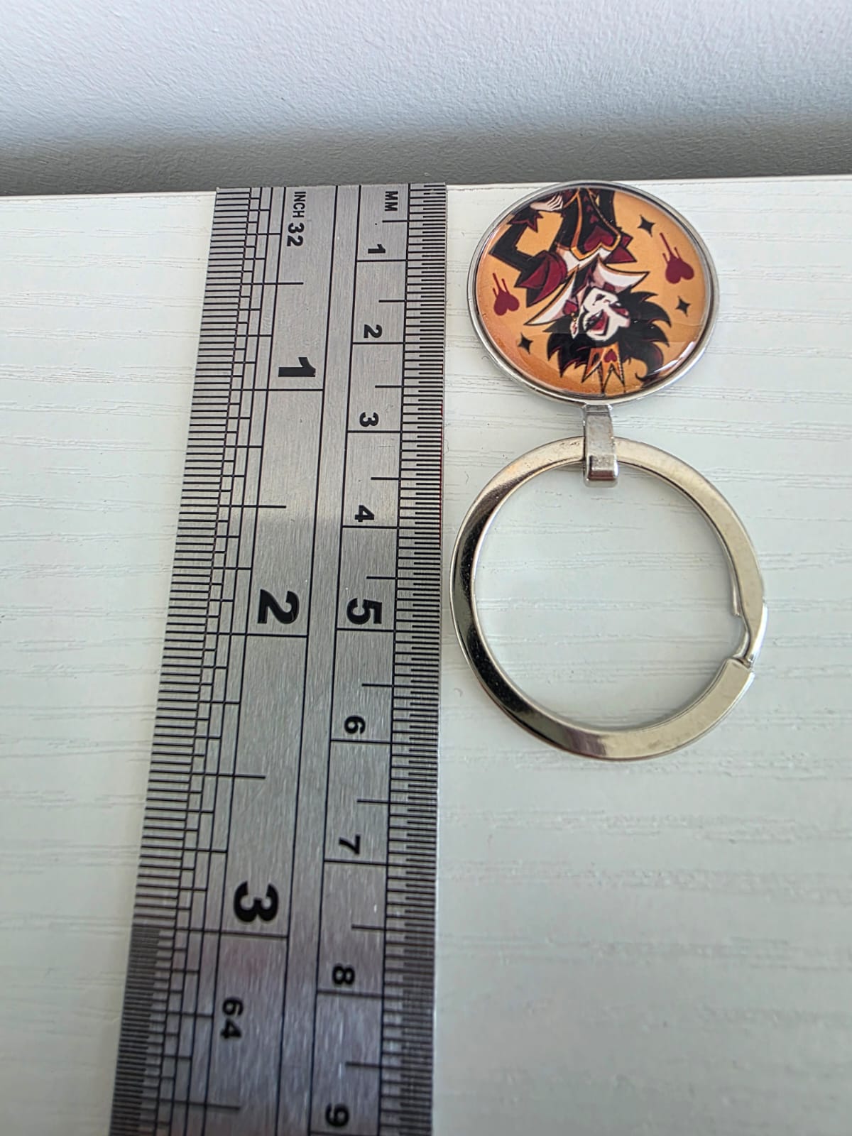 Alice in Wonderland Inspired Hellverse Queen of Hearts 25mm Cabochon Keyring
