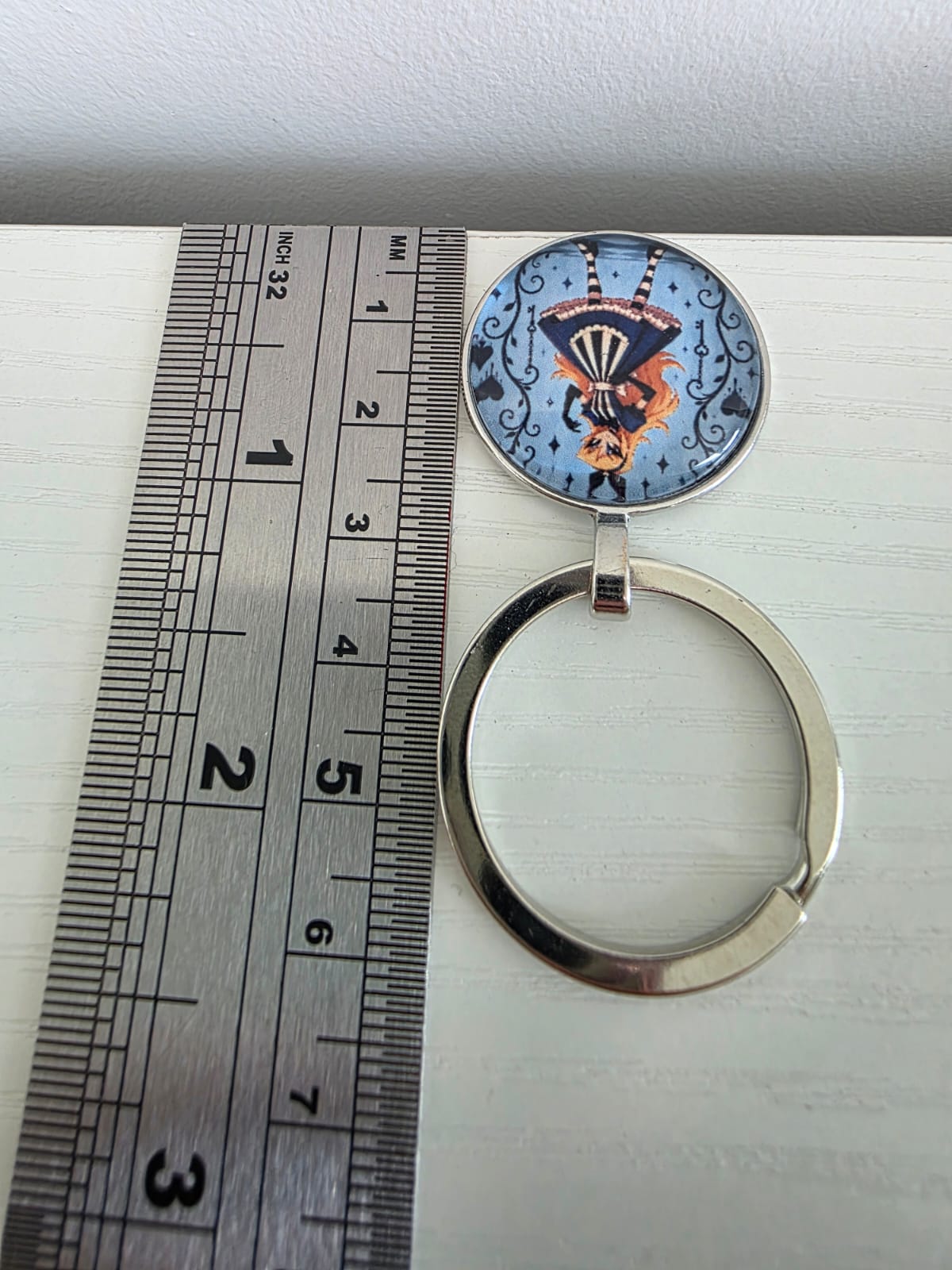 Alice in Wonderland Inspired Hellverse Alice 25mm Glass Cabochon Keyring
