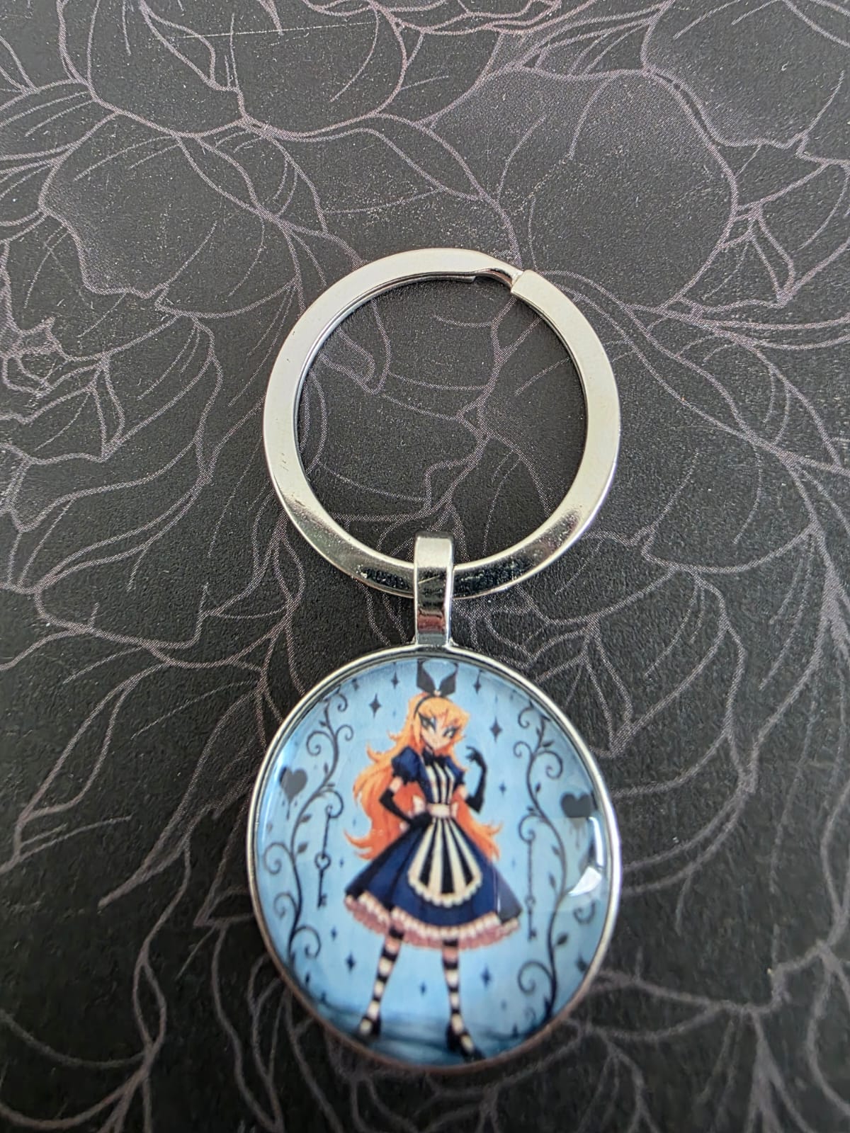 Alice in Wonderland Inspired Hellverse Alice 25mm Glass Cabochon Keyring