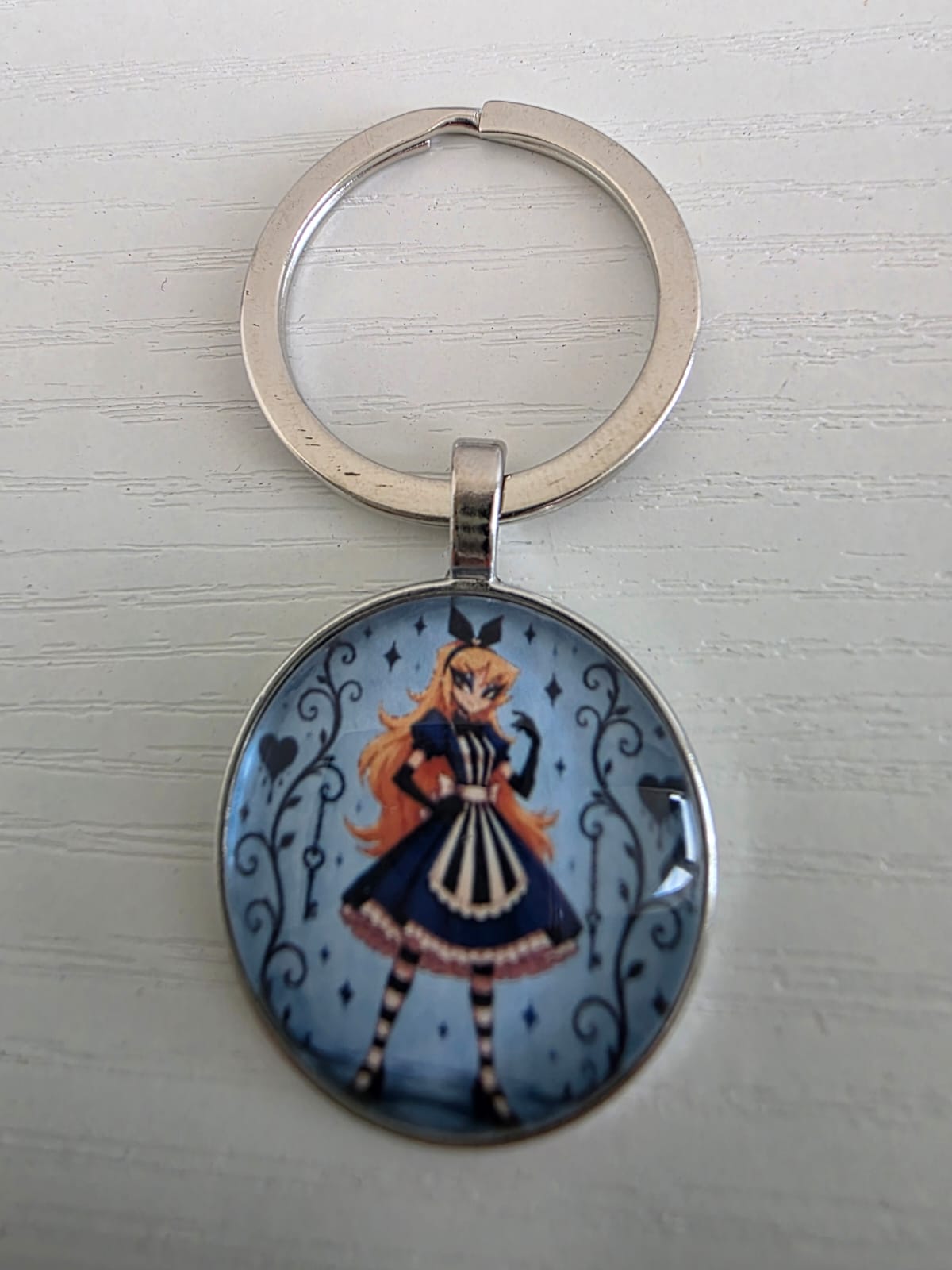 Alice in Wonderland Inspired Hellverse Alice 25mm Glass Cabochon Keyring
