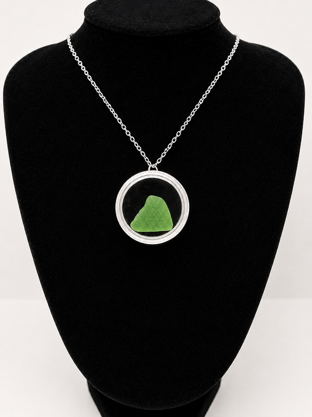 Sea Glass in a display case which can be opened as a pendant necklace on a stainless steel chain (Copy)