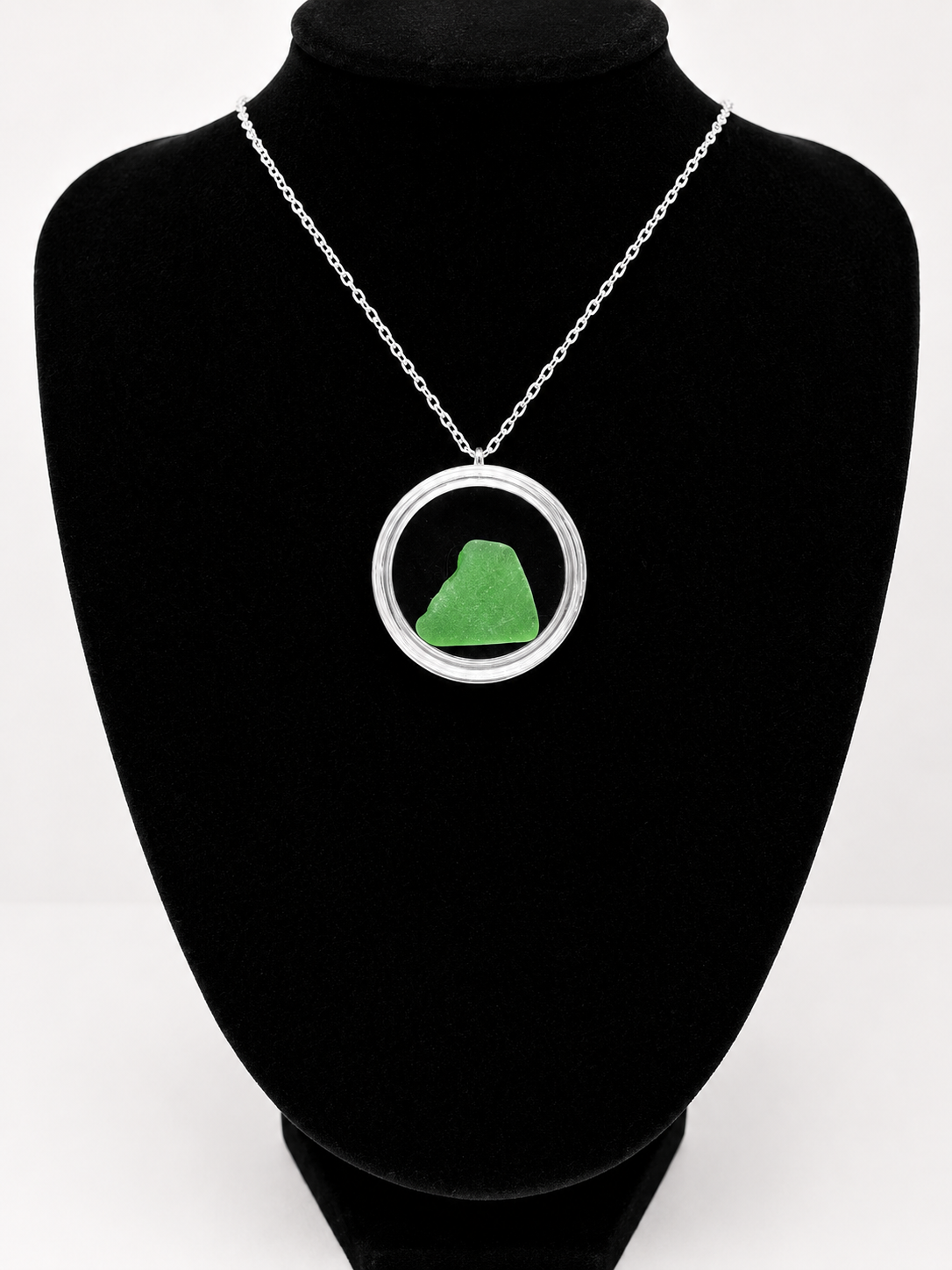 Sea Glass in a display case which can be opened as a pendant necklace on a stainless steel chain (Copy)