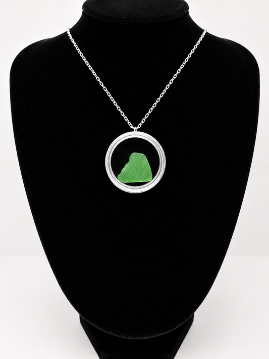 Sea Glass in a display case which can be opened as a pendant necklace on a stainless steel chain (Copy)